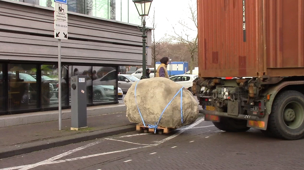 screenshot of video documentation of the tranportation of the rock